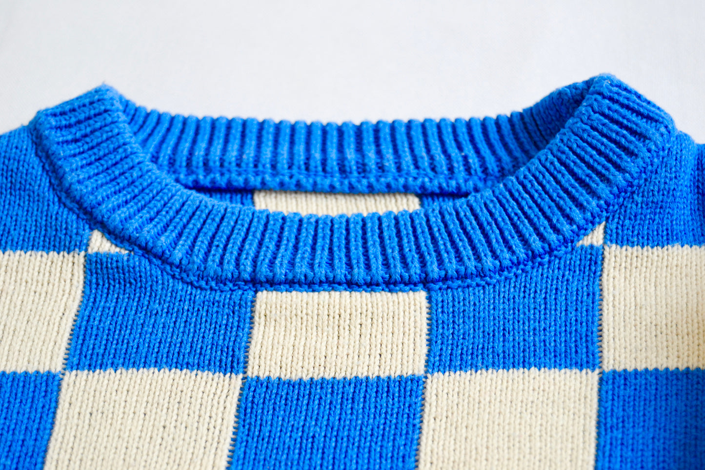 Pull à carreaux bleu Bymini 