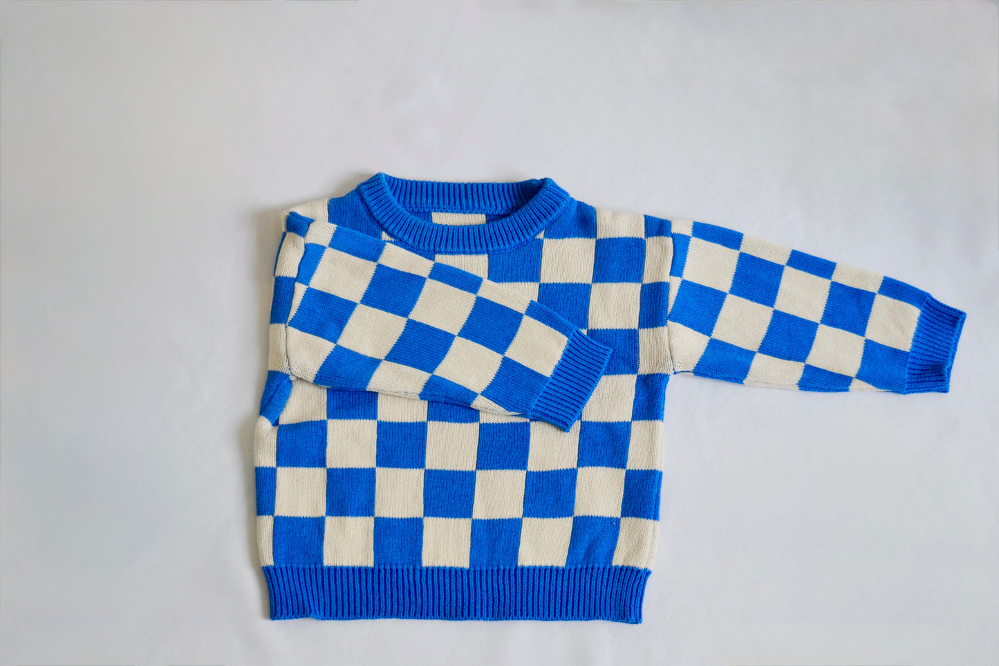 Pull à carreaux bleu Bymini 