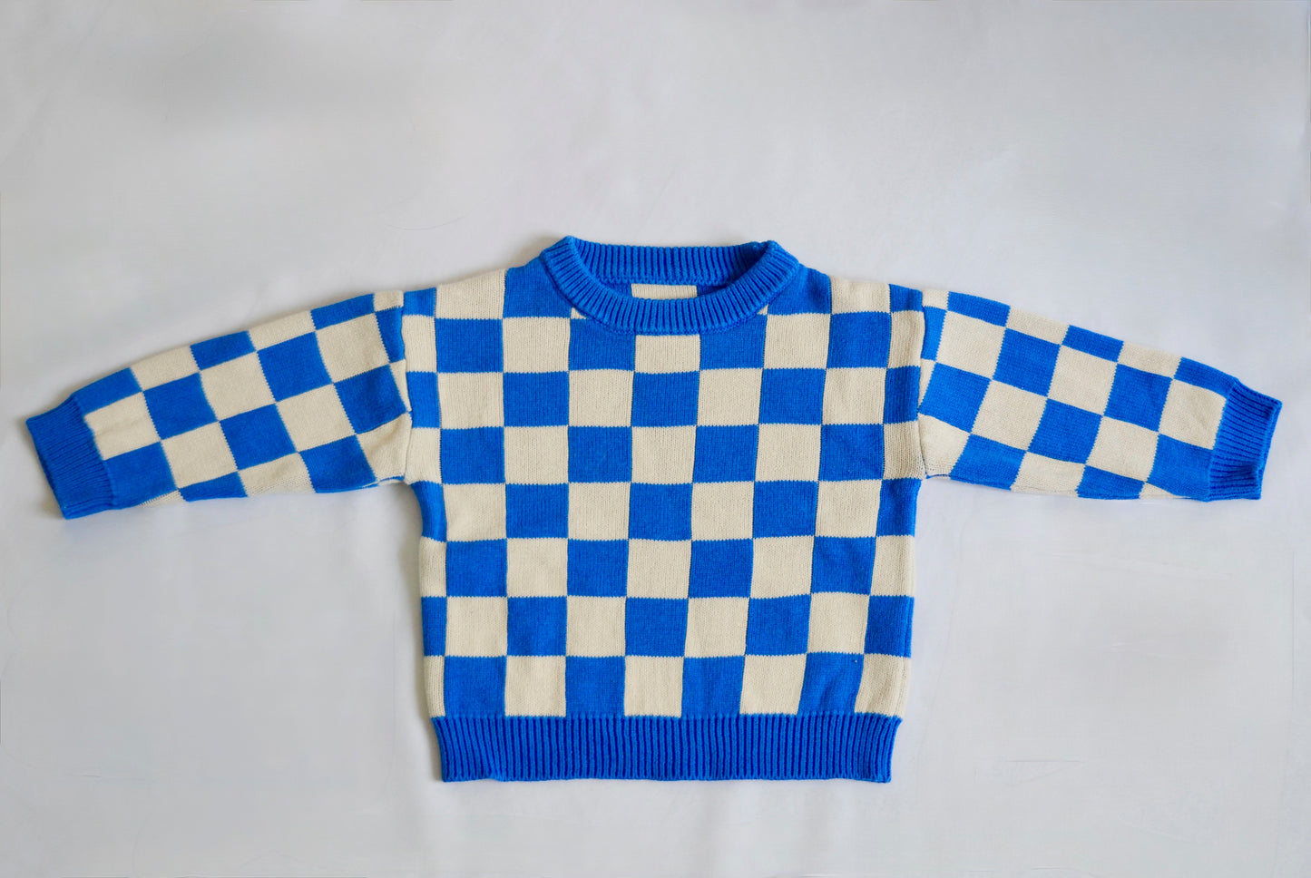 Pull à carreaux bleu Bymini 